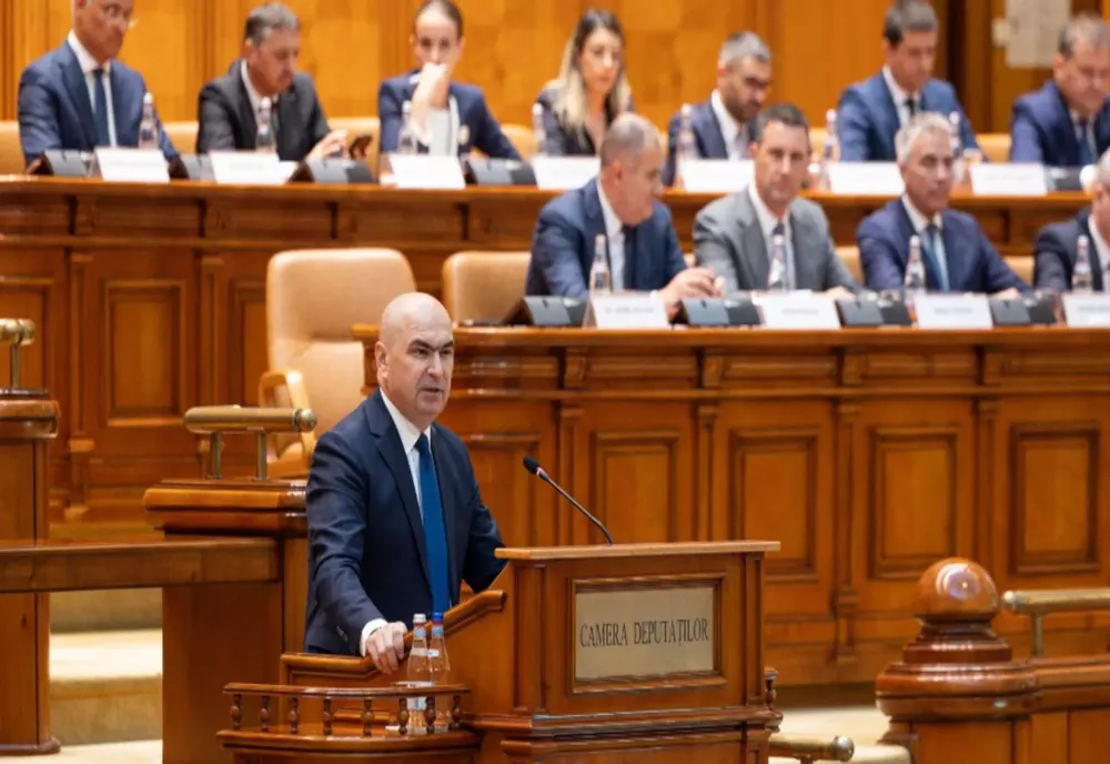 Premierul și doi miniștri, chemați, luni, la explicații în Parlament. AUR pregătește o moțiune de cenzură