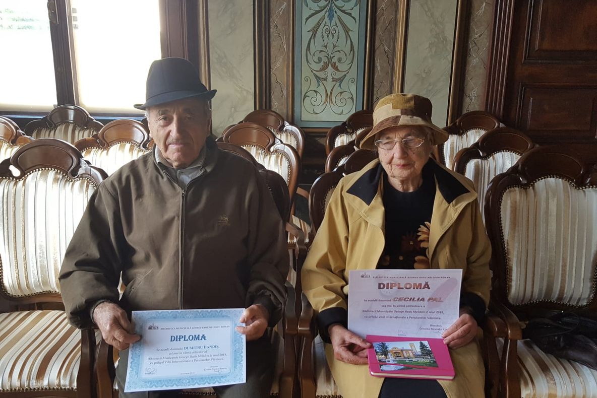Profesorul Cecilia Pal și inginerul  Dumitru Dandiș, cei mai în vârstă utilizatori ai Bibliotecii ”George Radu Melidon”
